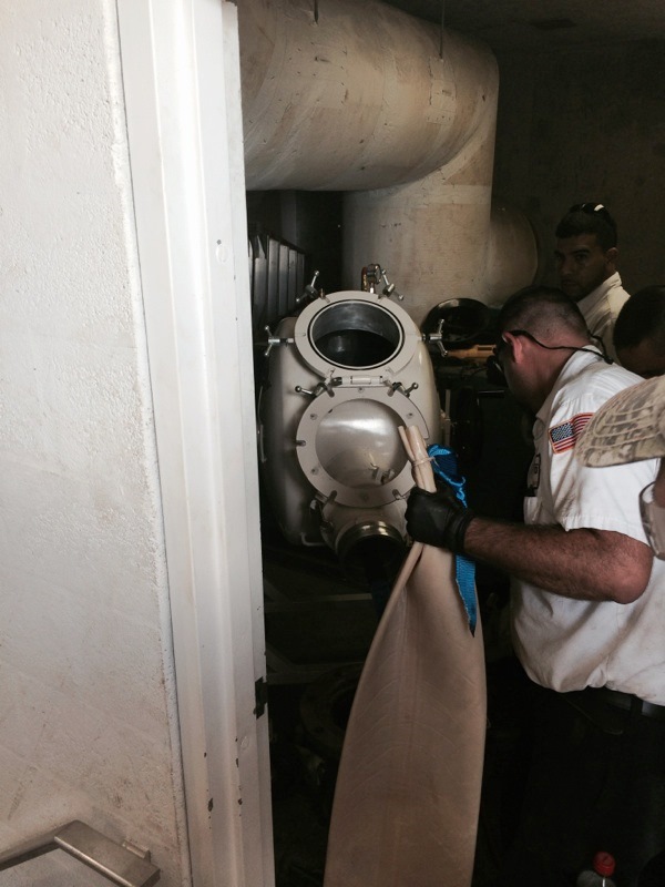 Plumber performing pipe relining for damaged sewer line