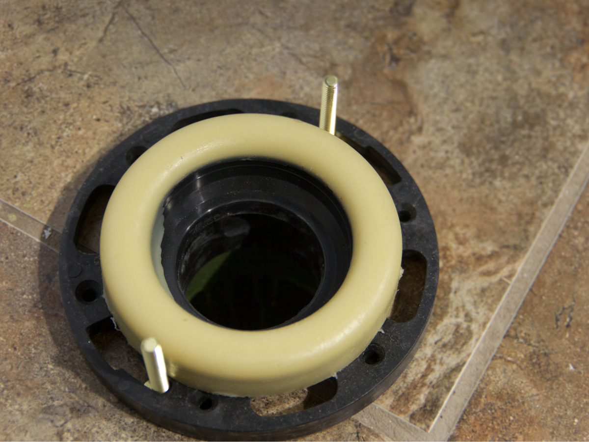 new wax ring installed for toilet replacement