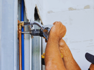 Plumber installing new shower